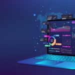 Laptop displaying colorful data analytics dashboard with graphs, charts, and world map on a blue gradient background.